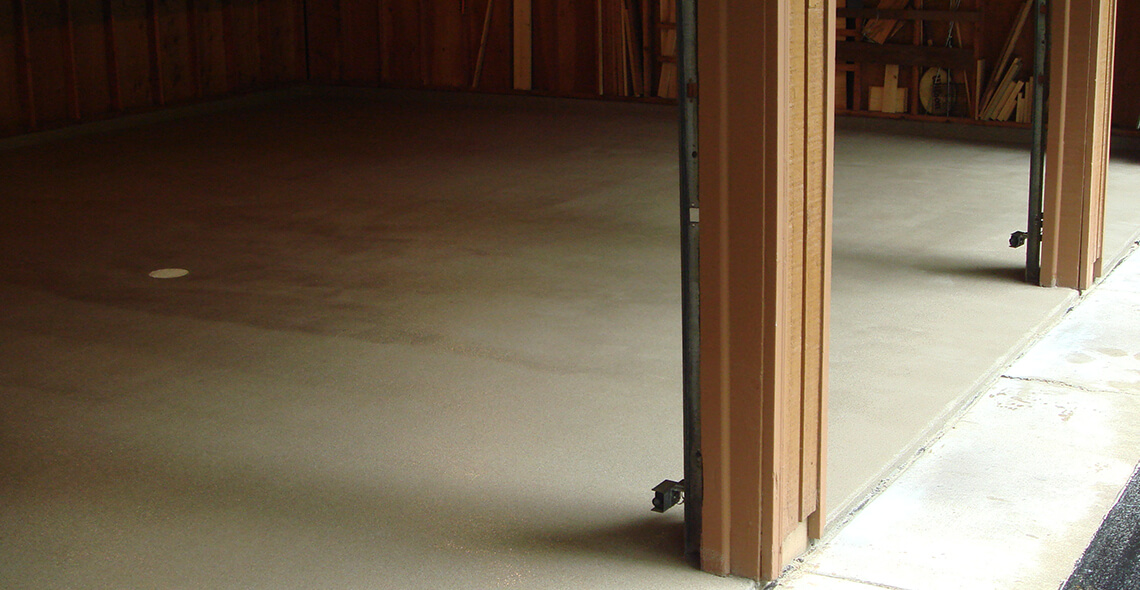 concrete garage floor with floor drain